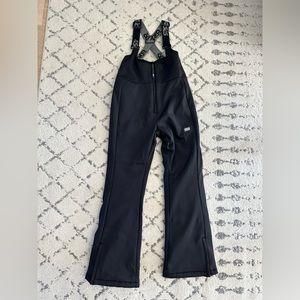 Black Ski Bib Overalls with Wide Leg and Adjustable Strap